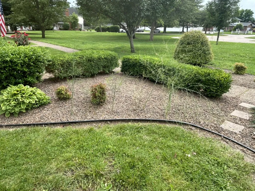 Custom garden landscaping for residential properties in Poseyville, IN by J&L LawnCare