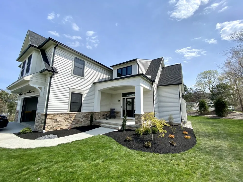 Reliable lawn mowing service for outdoor upgrades in Mentor, OH by JLC Landscaping