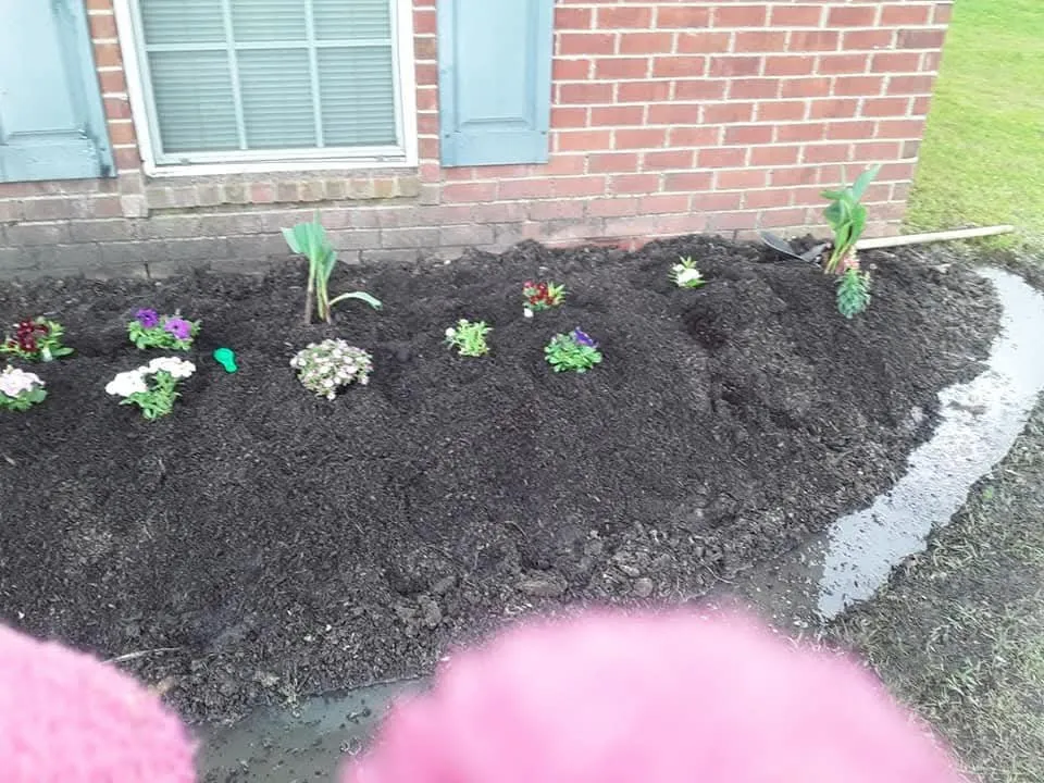 Professional outdoor landscaping with custom design in Monroe, LA by JLC Lawn Care