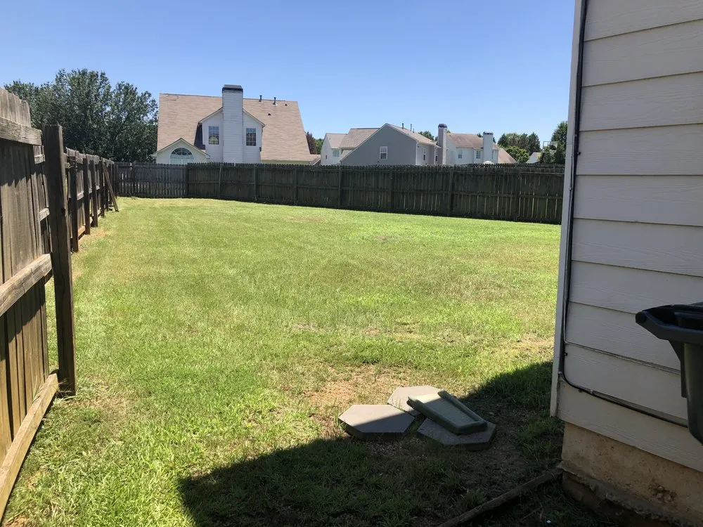 Custom lawn care service for residential properties in Locust Grove, GA by JL&M Landscaping