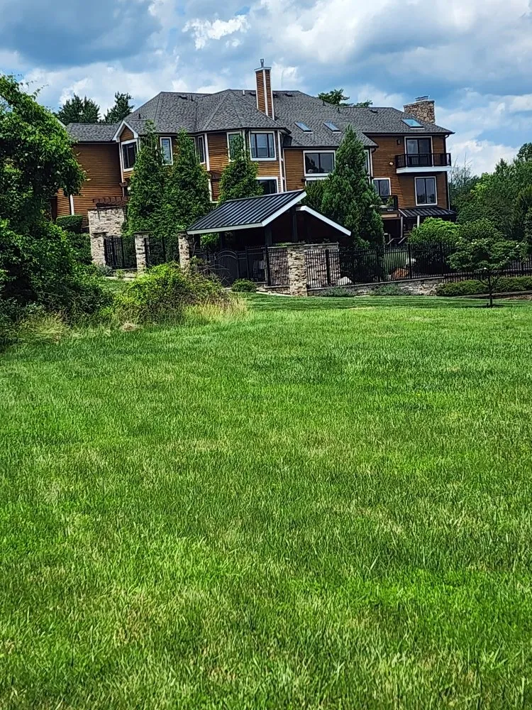 Professional lawn mowing service for homes in Raritan, NJ by JM Construction and Landscaping