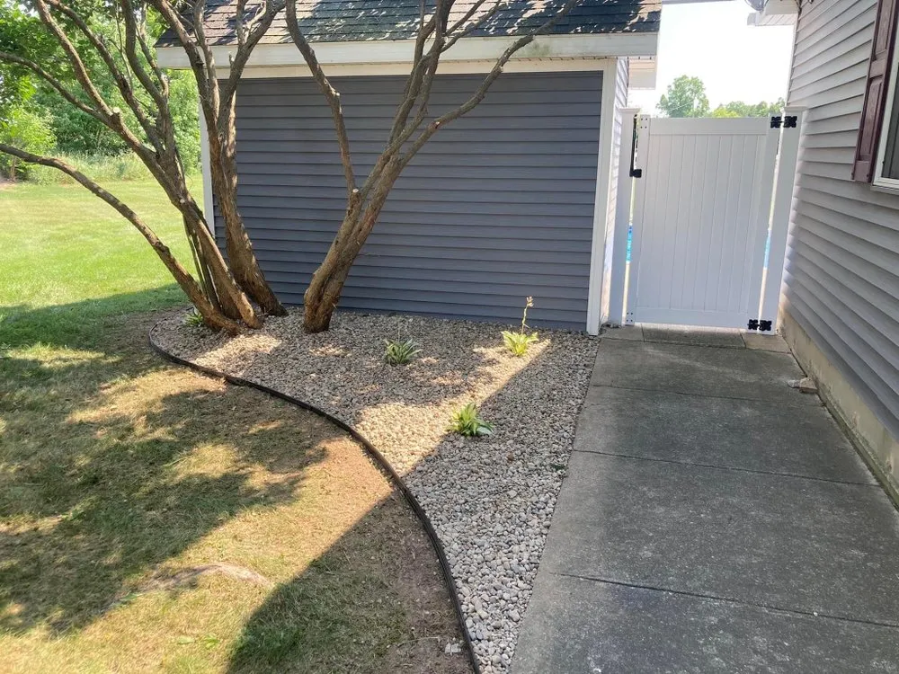 Custom garden landscaping for outdoor upgrades in Mulliken, MI by JM Lawn & Landscape