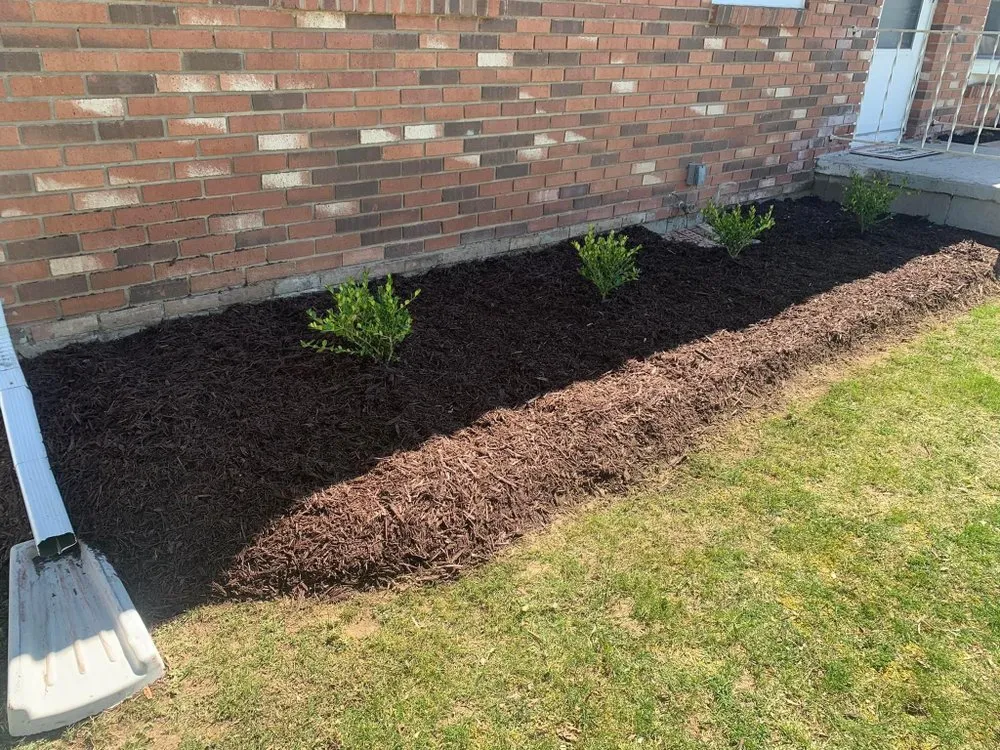 Custom landscape design with custom design in Mulliken, MI by JM Lawn & Landscape