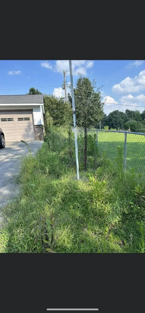 Professional lawn mowing service for homes in Athens, TN by J&M Lawn Care Cleaning Service