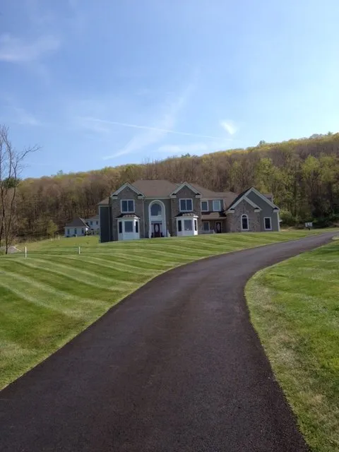 Affordable lawn mowing service with custom design across Hackettstown, NJ - J&M Outdoor Enterprises