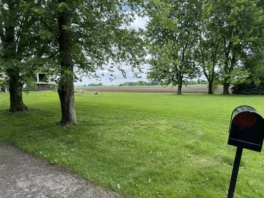 JM Premier Lawn Solutions Logo