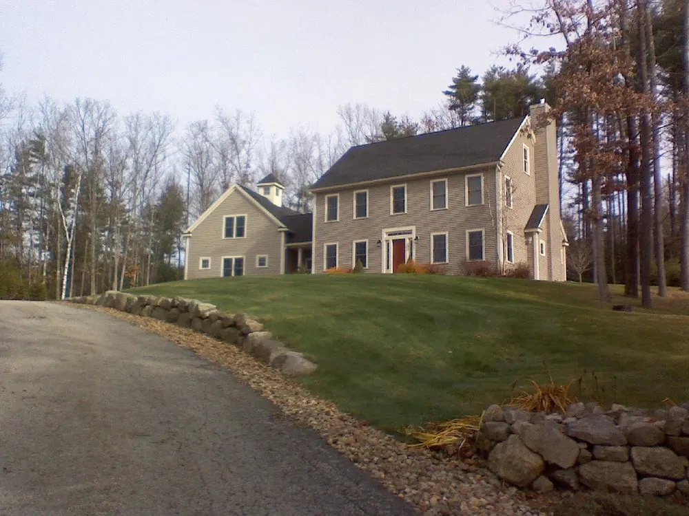 Expert yard cleanup service for residential properties in Merrimack, NH by JMC Landscaping