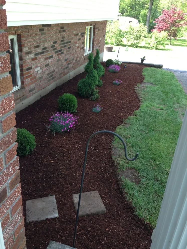 Custom yard cleanup service for year-round maintenance across Billerica, MA - J.M.Mullen & Co Landscaping & Snow Removal