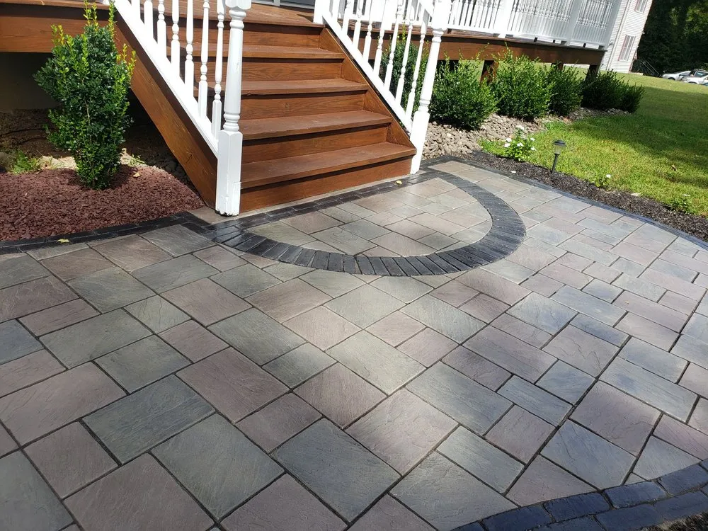 Professional landscape installation for year-round maintenance in Marlboro, NY by J&N Stafford