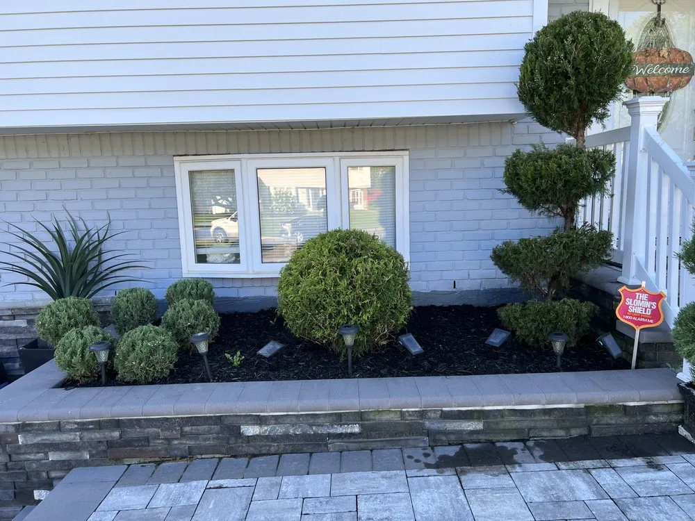 Local yard maintenance for outdoor upgrades in Brentwood, NY by JNC Landscaping