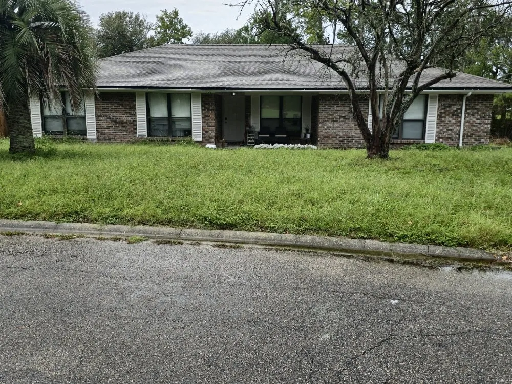 Professional lawn mowing service with custom design in Orange Park, FL by Joat Landscaping