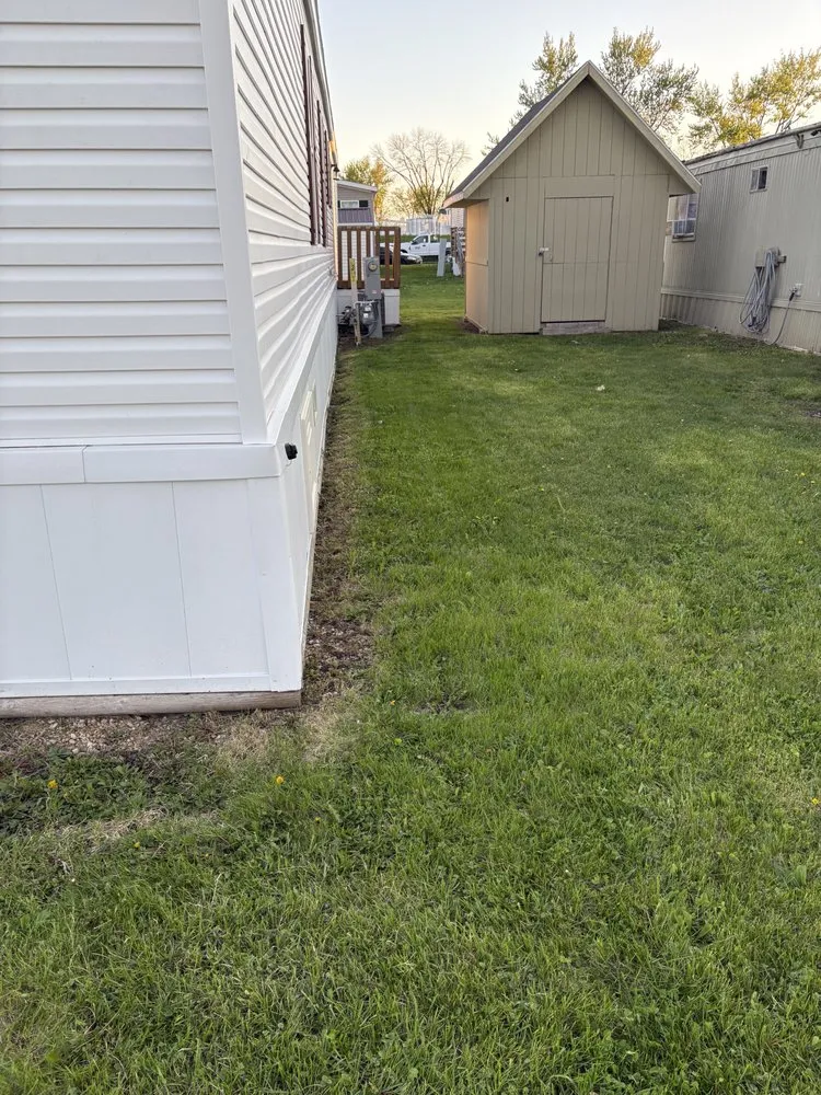 Custom outdoor landscaping with custom design in Cedar Rapids, IA by Jobys Lawncare Services