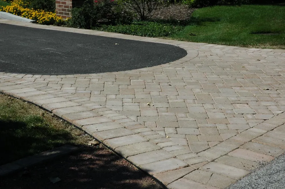 Affordable lawn care service for year-round maintenance in Highland Park, IL by Joe & Tony Landscaping