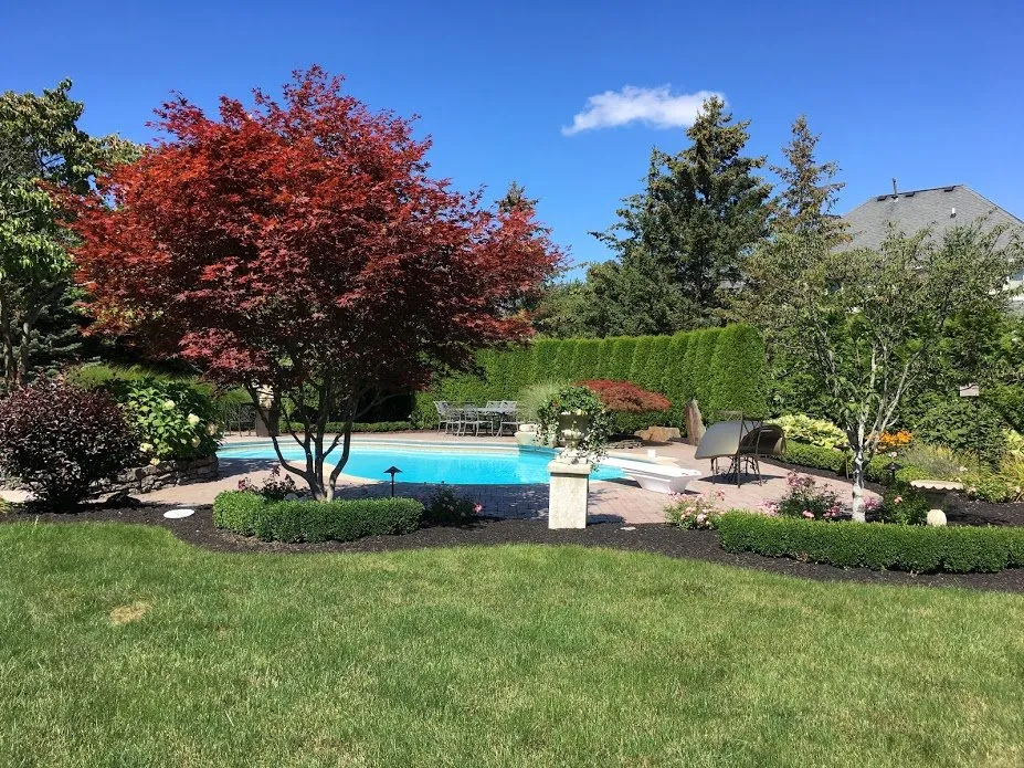 Local yard maintenance with custom design across Rochester, NY - Joe Arcuri Landscaping