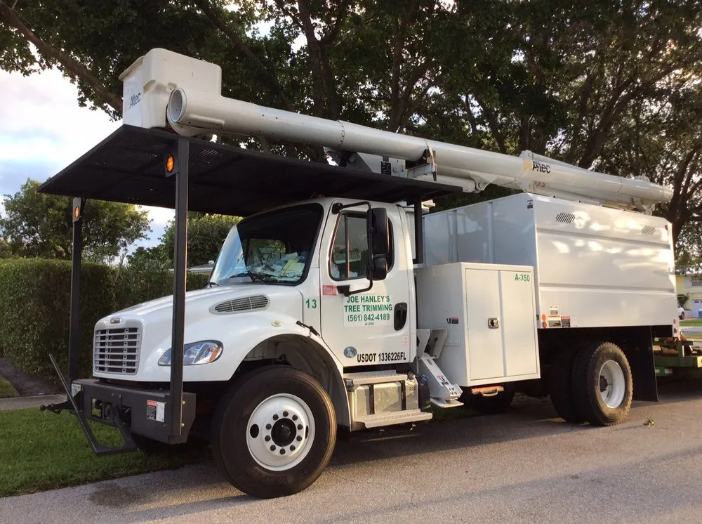 Custom garden landscaping near you in North Palm Beach, FL by Joe Hanley's Tree Trimming