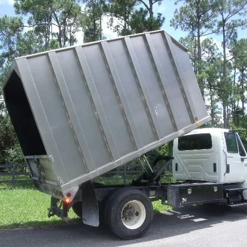 Custom outdoor landscaping with custom design in North Palm Beach, FL by Joe Hanley's Tree Trimming