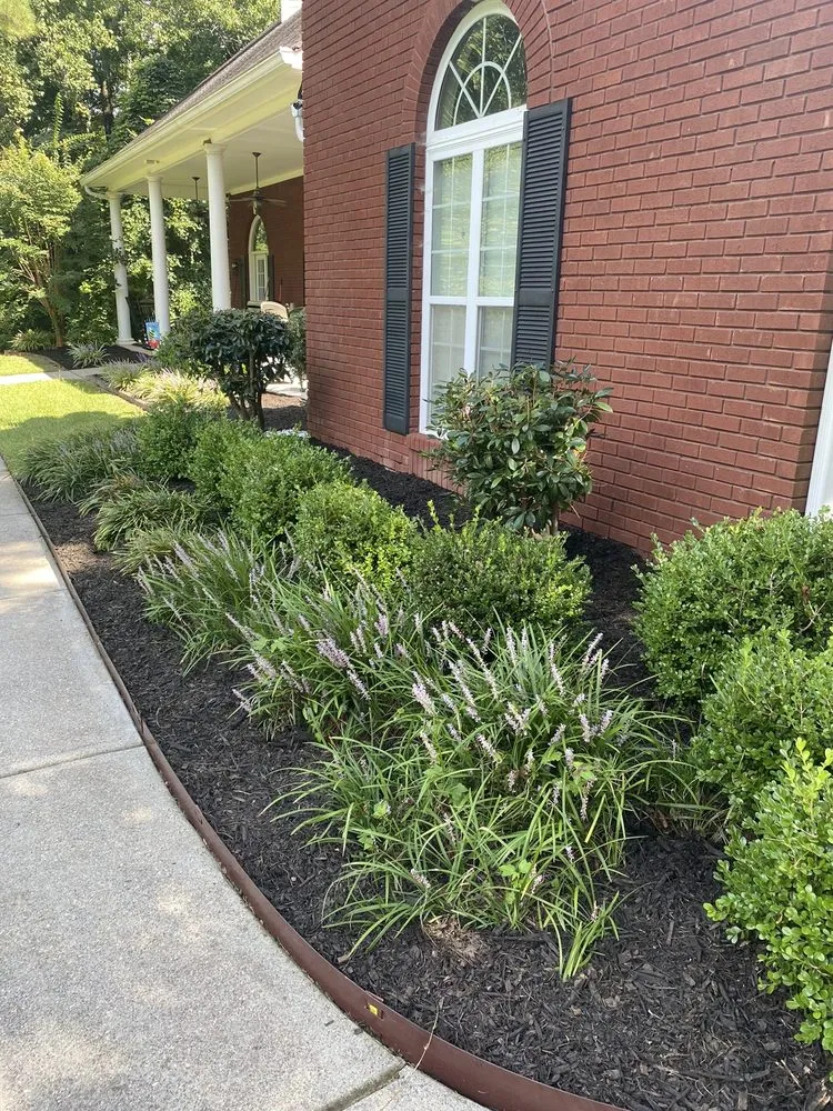 Custom outdoor landscaping in Snellville, GA by JoeAbel Lawn Care