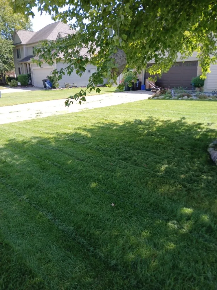 Custom lawn mowing service for homes in Grand Blanc, MI by Joe's lawn service