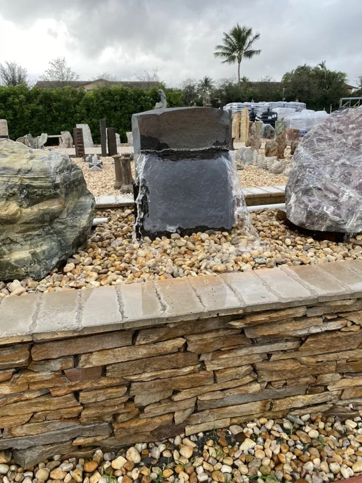 Custom landscape design in Lake Worth, FL by Joey & Sons