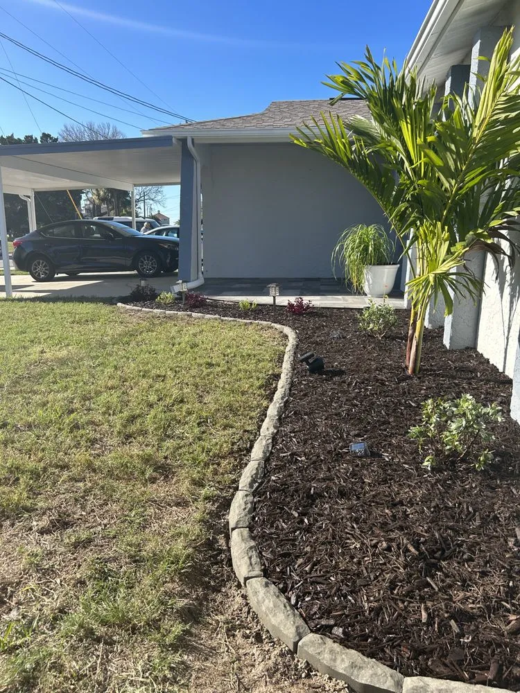 Custom landscape installation for homes in Springhill, FL by Joey's Weeding and Landscaping