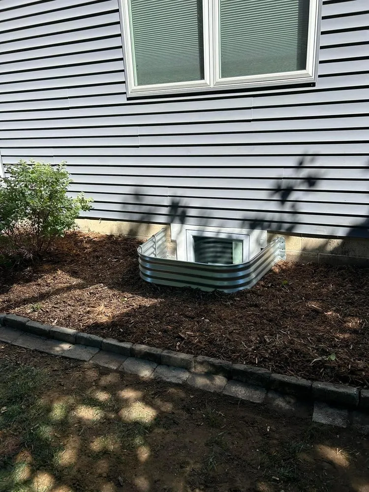 Affordable yard maintenance for residential properties across Osage, IA - Johanns Tree Services & More