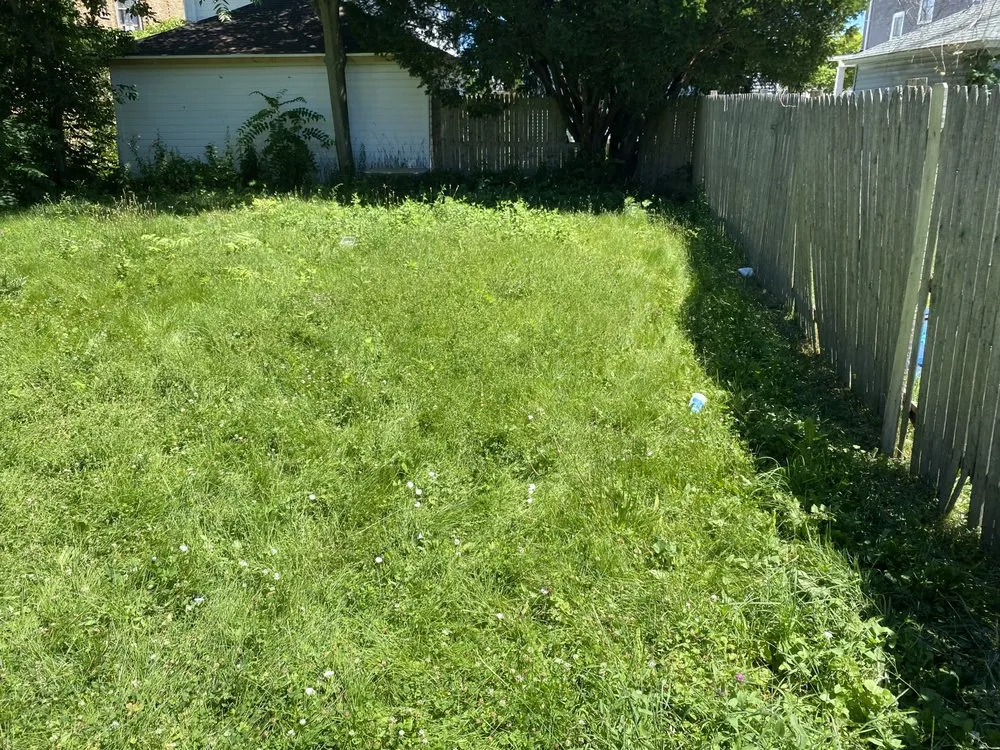 Custom garden landscaping with custom design across Racine, WI - John Boyz Lawncare & Moving