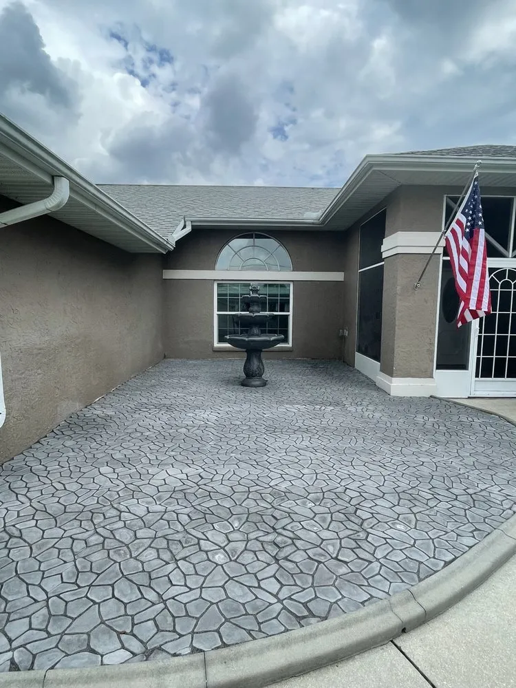 Affordable lawn mowing service for residential properties in Port Charlotte, FL by John Comeau & Son Mowing Services