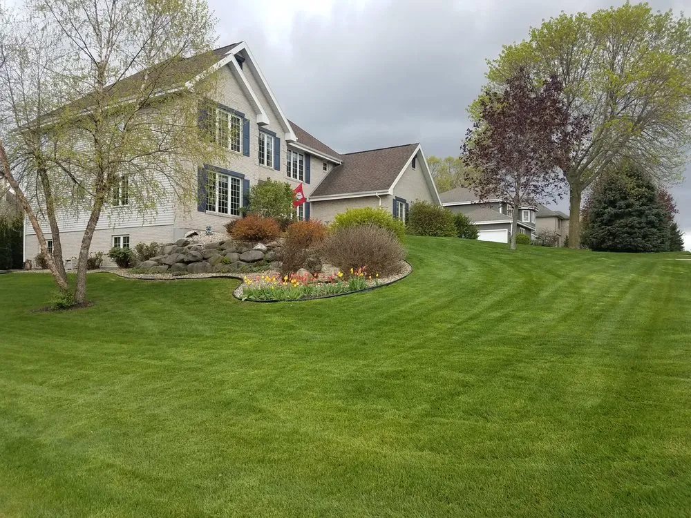 Custom lawn care service for year-round maintenance in Stoughton, WI by John Flatman Precision Mowing