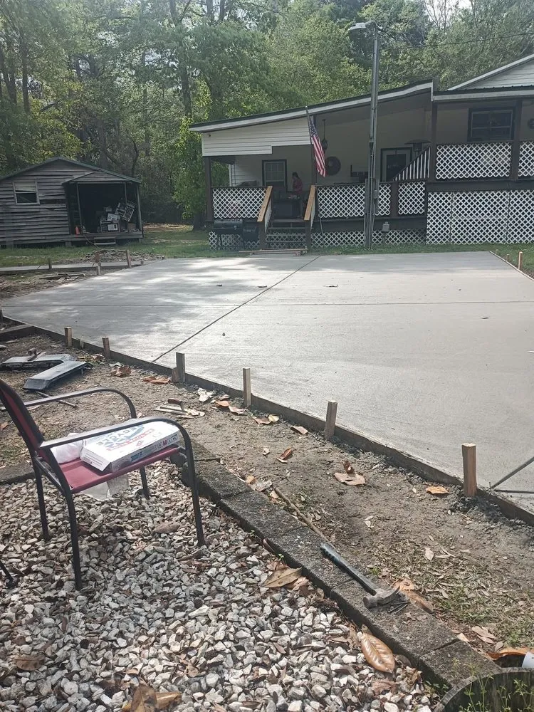 Professional lawn mowing service with custom design in Gulfport, MS by John John's Small Construction