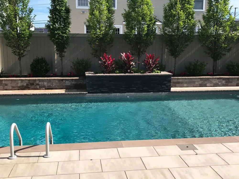 Trusted lawn mowing service near you in Smithtown, NY by John Joseph Custom Pools & Masonry