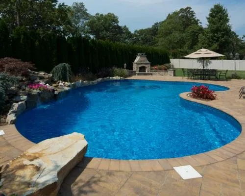 Professional residential landscaping for year-round maintenance across Smithtown, NY - John Joseph Custom Pools & Masonry