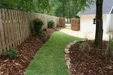 Custom lawn mowing service for year-round maintenance in Birmingham, AL by John Russell Landscape Architect