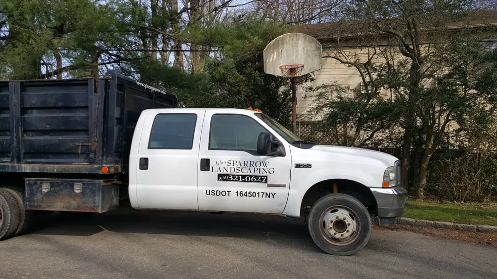 Reliable lawn mowing service in North Babylon, NY by John Sparrow Landscape