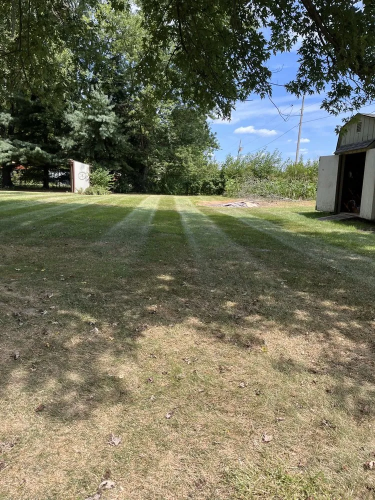 Professional yard maintenance for residential properties in Greenfield, IN by John Whiteside Landscaping Construction