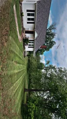 Johnny Bee Lawn Care Services Logo