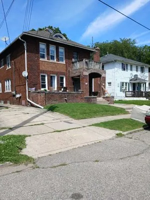 Johnny Ds Lawn Service Logo