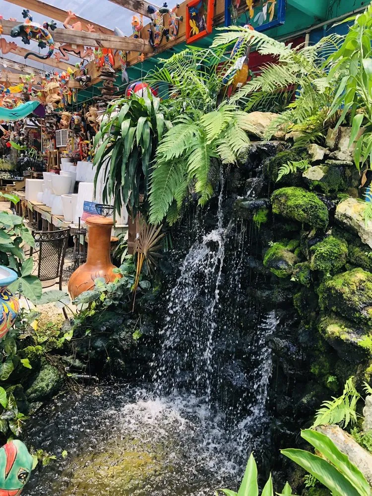 Affordable lawn care service for homes in Delray Beach, FL by Johnny Mangos Garden Center