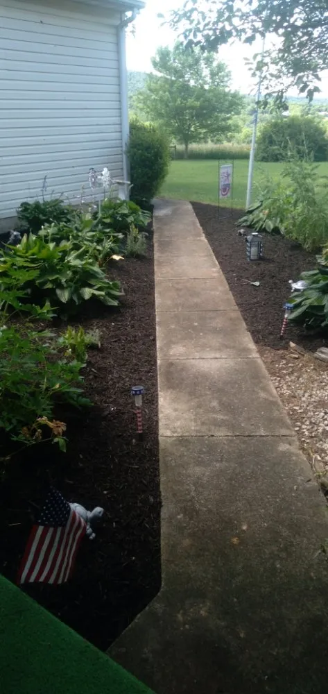 Custom outdoor landscaping for beautiful yards across Shermans Dale, PA - Johnny On The Spot Landscaing & Construction