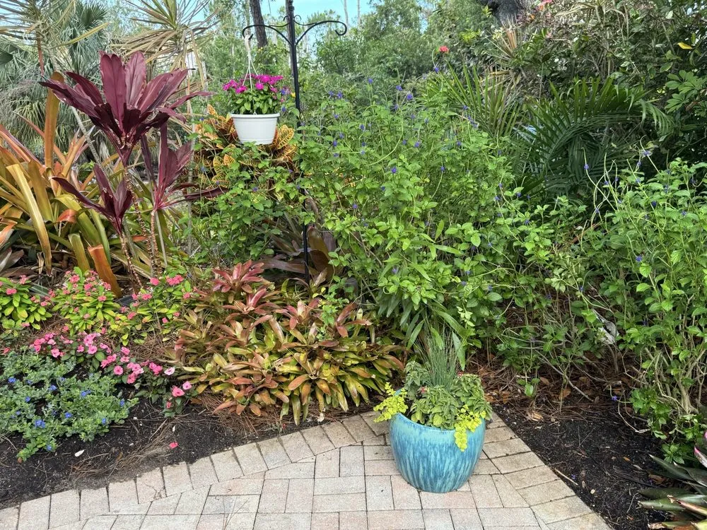 Trusted lawn mowing service for homes in Bonita Springs, FL by Johnny On The Spot Lawn Maintenance