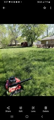 Johnny Onthespot Landscaping Services Logo