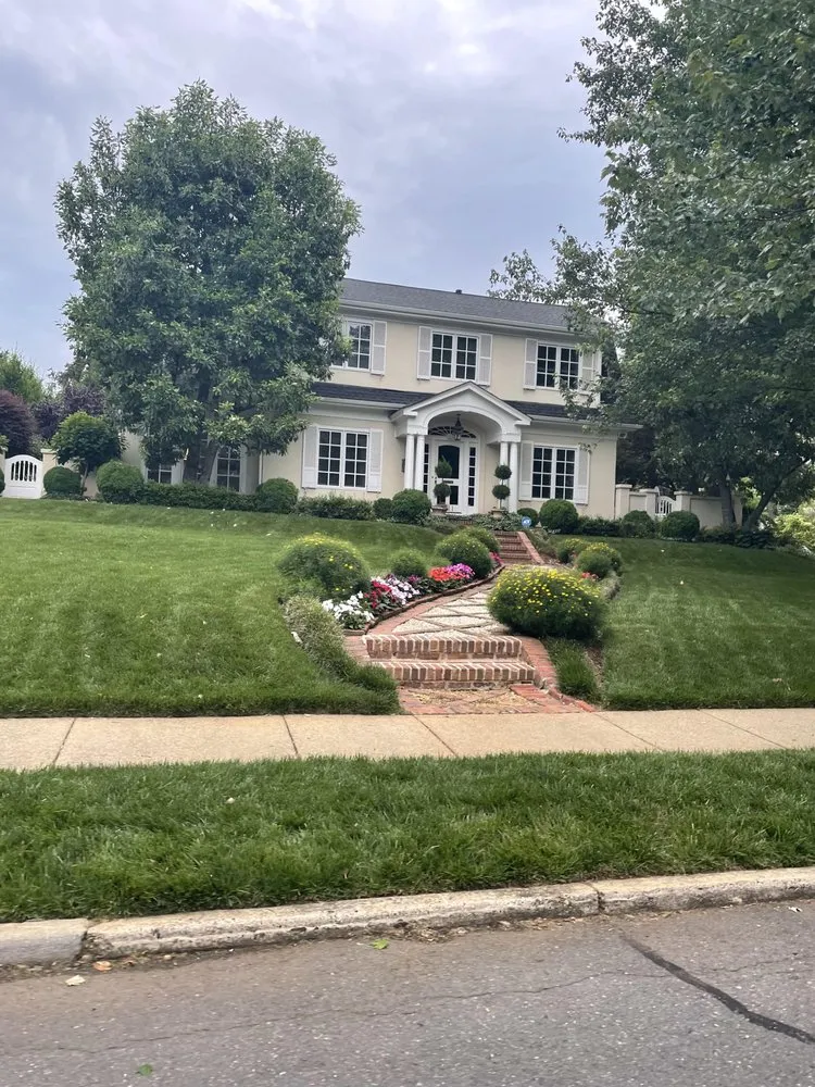 Professional yard cleanup service for homes in Greensboro, NC by John's landscaping