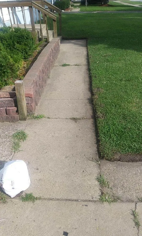 Affordable lawn mowing service with custom design across Hammond, IN - John's Lawn Care Service