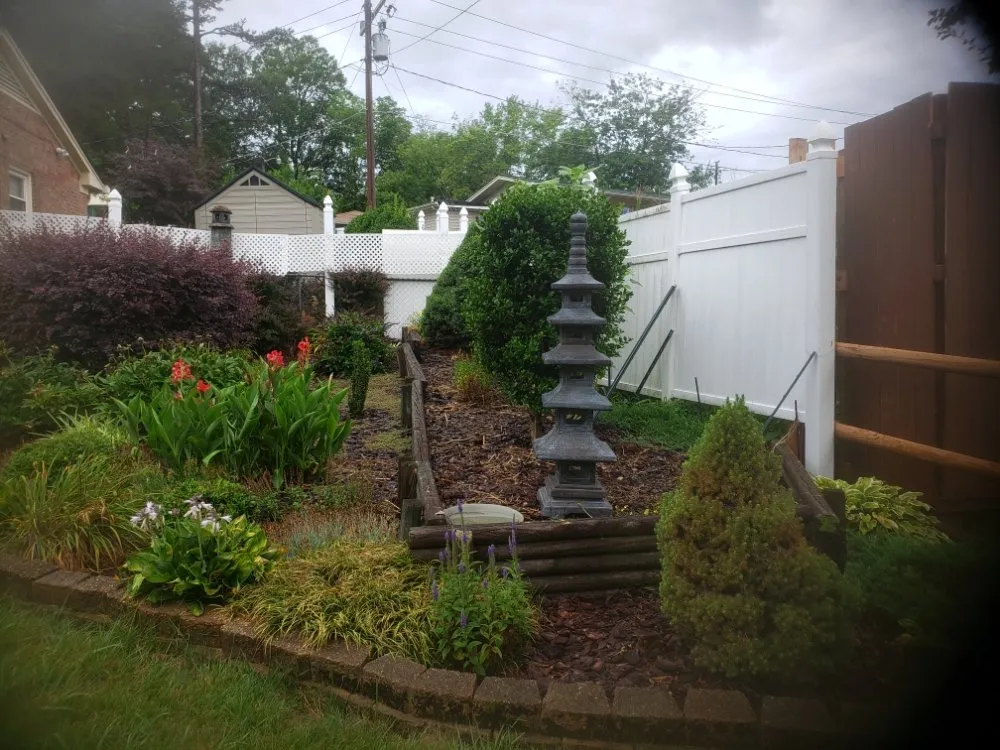 Custom yard maintenance with custom design across Greensboro, NC - John's Lawn Mower Service & More