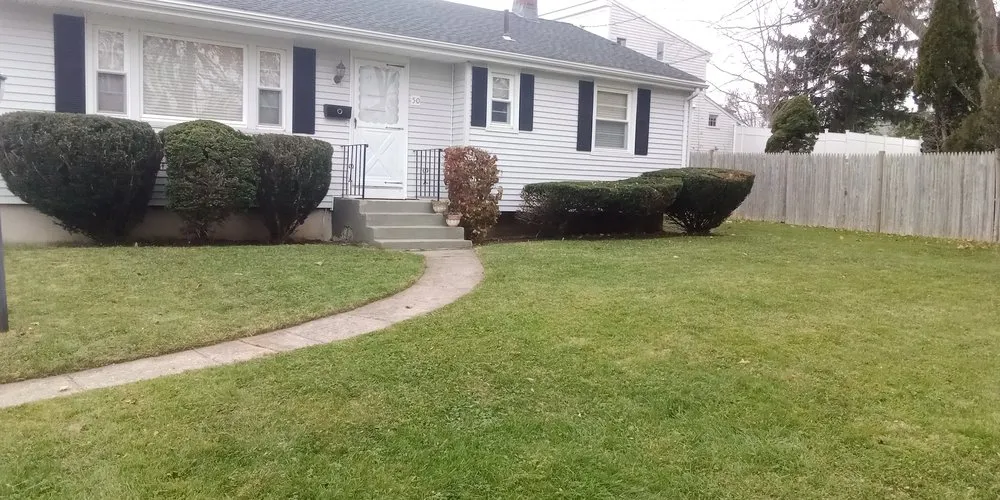 Professional yard cleanup service in Middletown, RI - John's Lawns