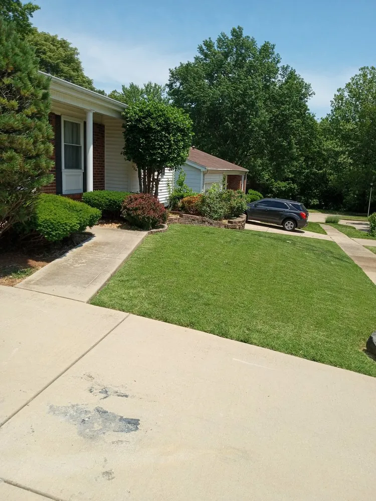 Custom lawn mowing service for outdoor upgrades across Florissant, MO - Johnson And Family Solutions