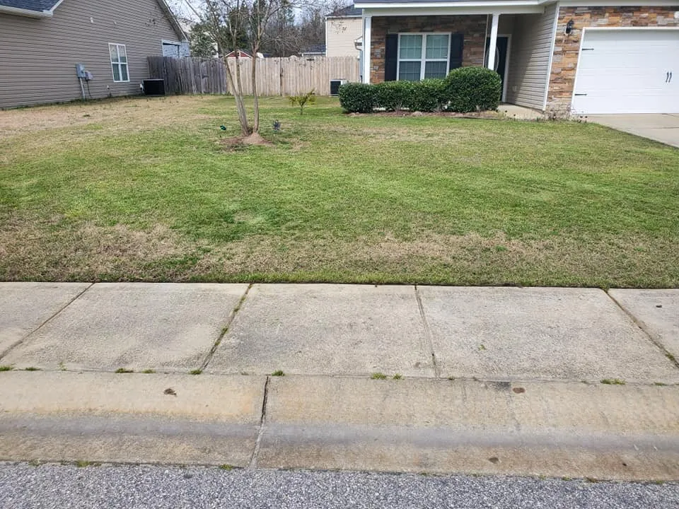 Expert lawn mowing service for year-round maintenance across Fayetteville, NC - Johnson Enterprise