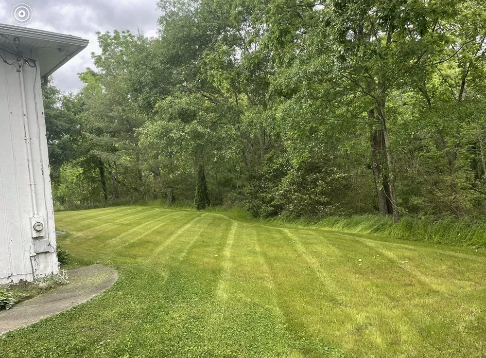 Professional lawn care service for residential properties in Cumming, GA by Johnson Lawn Care and landscaping