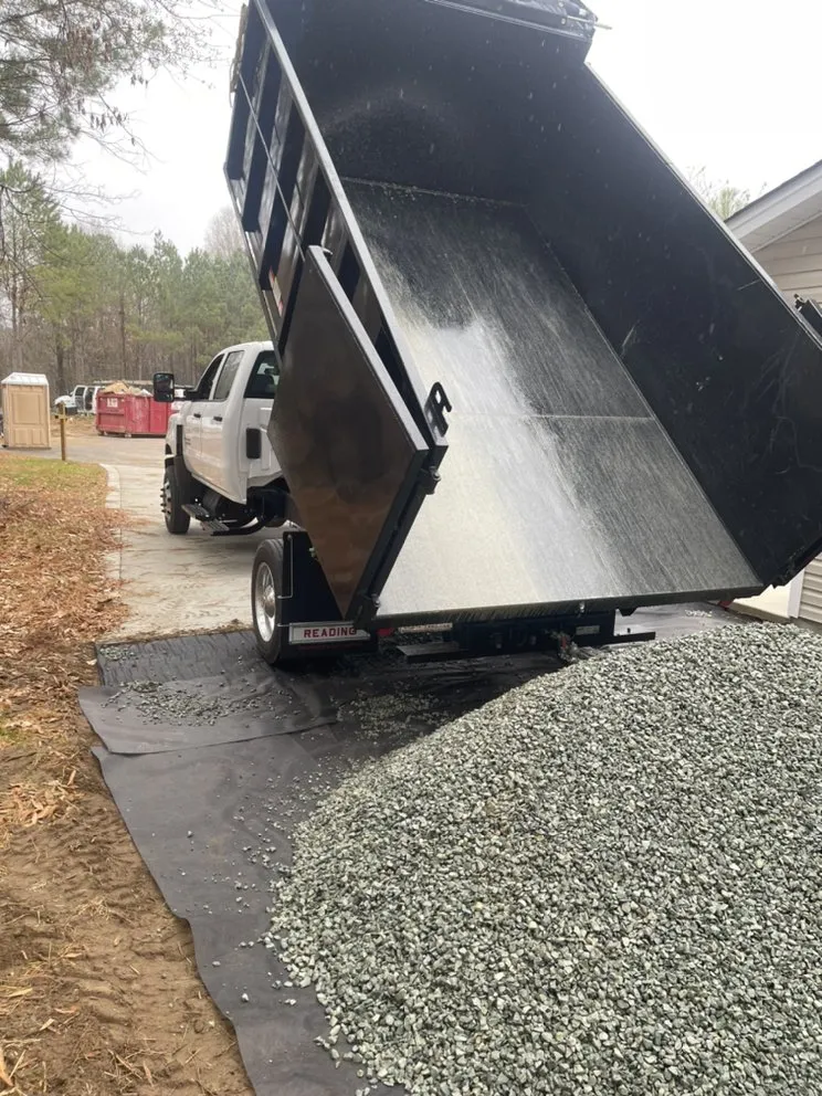 Custom landscape design for year-round maintenance in Sanford, NC by Johnson Lawncare and Haul