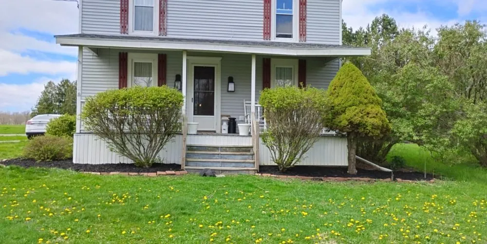 Custom outdoor landscaping in Albion, NY by Johnson Services