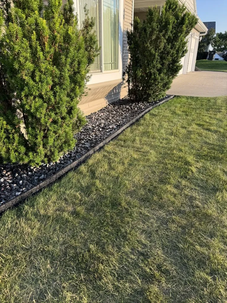 Custom yard cleanup service with custom design across Bismarck, ND - Johnson’s Lawn Service